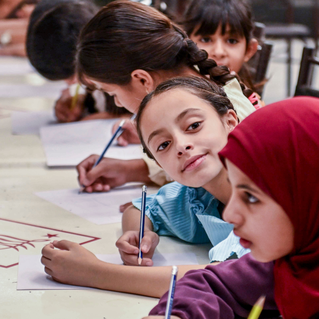 Zeina, de 9 años. En una actividad en un centro de protección infantil. Siria.